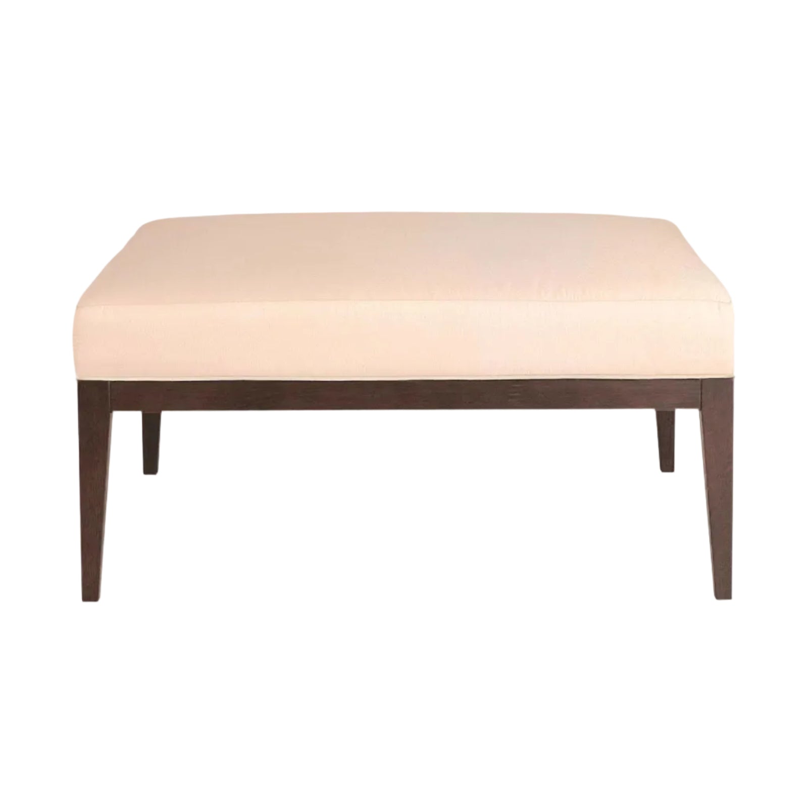 Beige ottoman with wooden legs on a white background