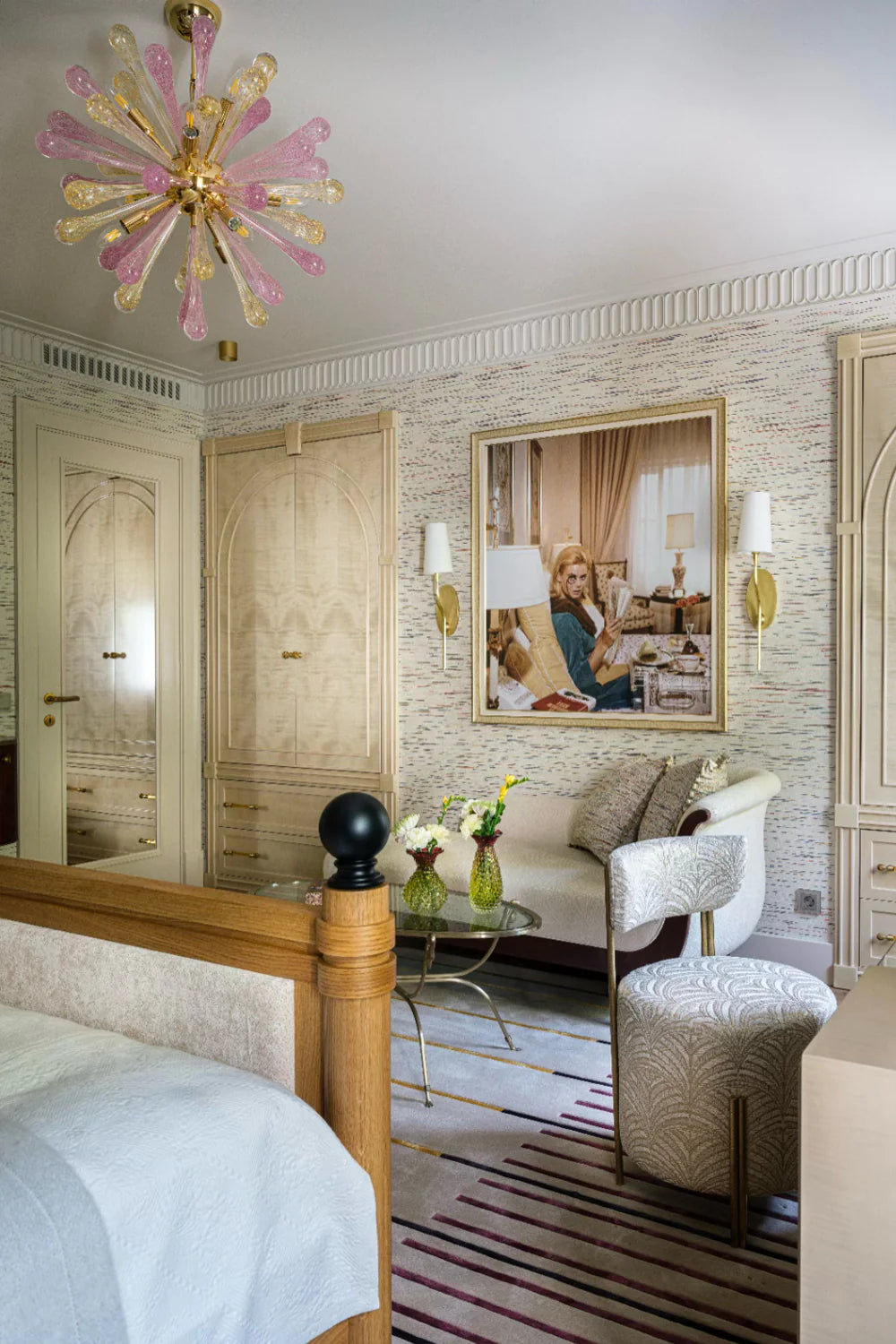 Project Rosinka Master Bedroom with white chaise lounge, swan head coffee table and round chair.