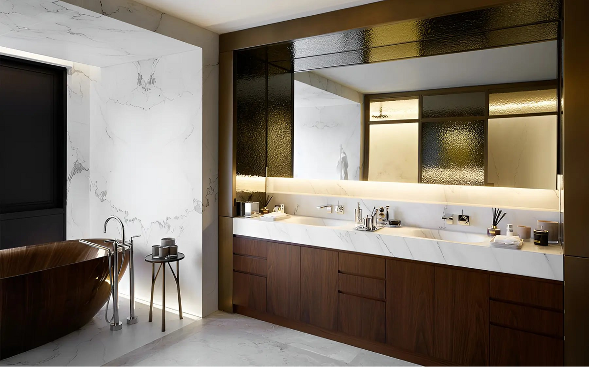 A luxury modern bathroom featuring a double-sink vanity with dark wood cabinets, white marble countertops, a large wall mirror, and a freestanding dark wood bathtub.