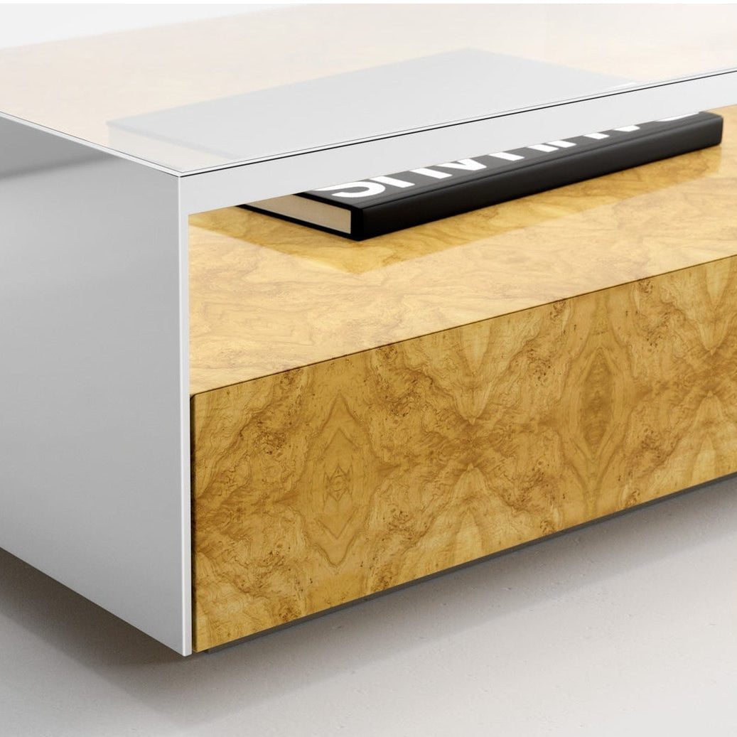 Coffee table with white top and wooden side on a white background