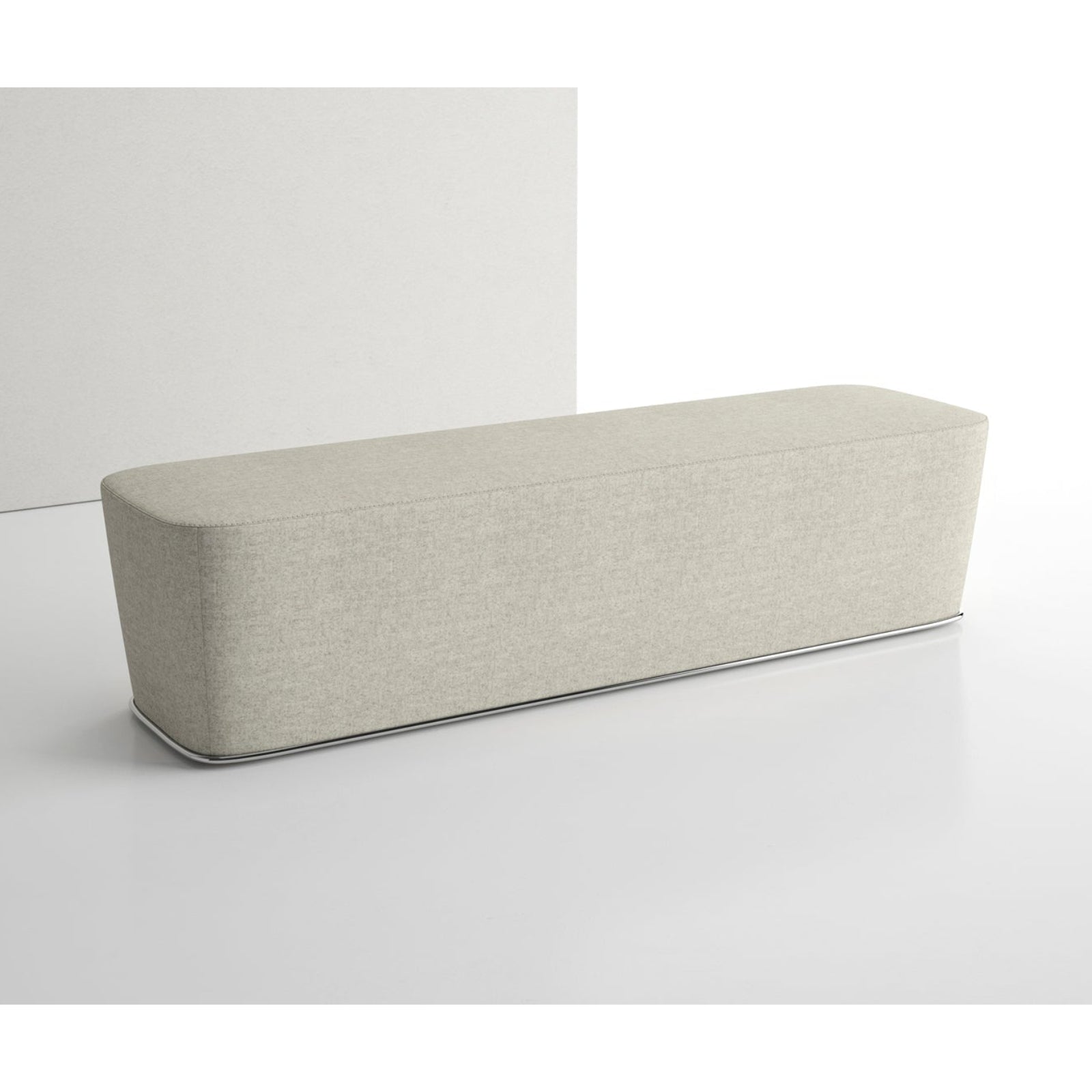 Rectangular ottoman with a textured surface on a white background